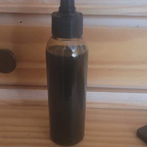 4oz Jamaican Black Castor infused with Rosemary Oil